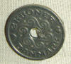Современная монета с отверстием